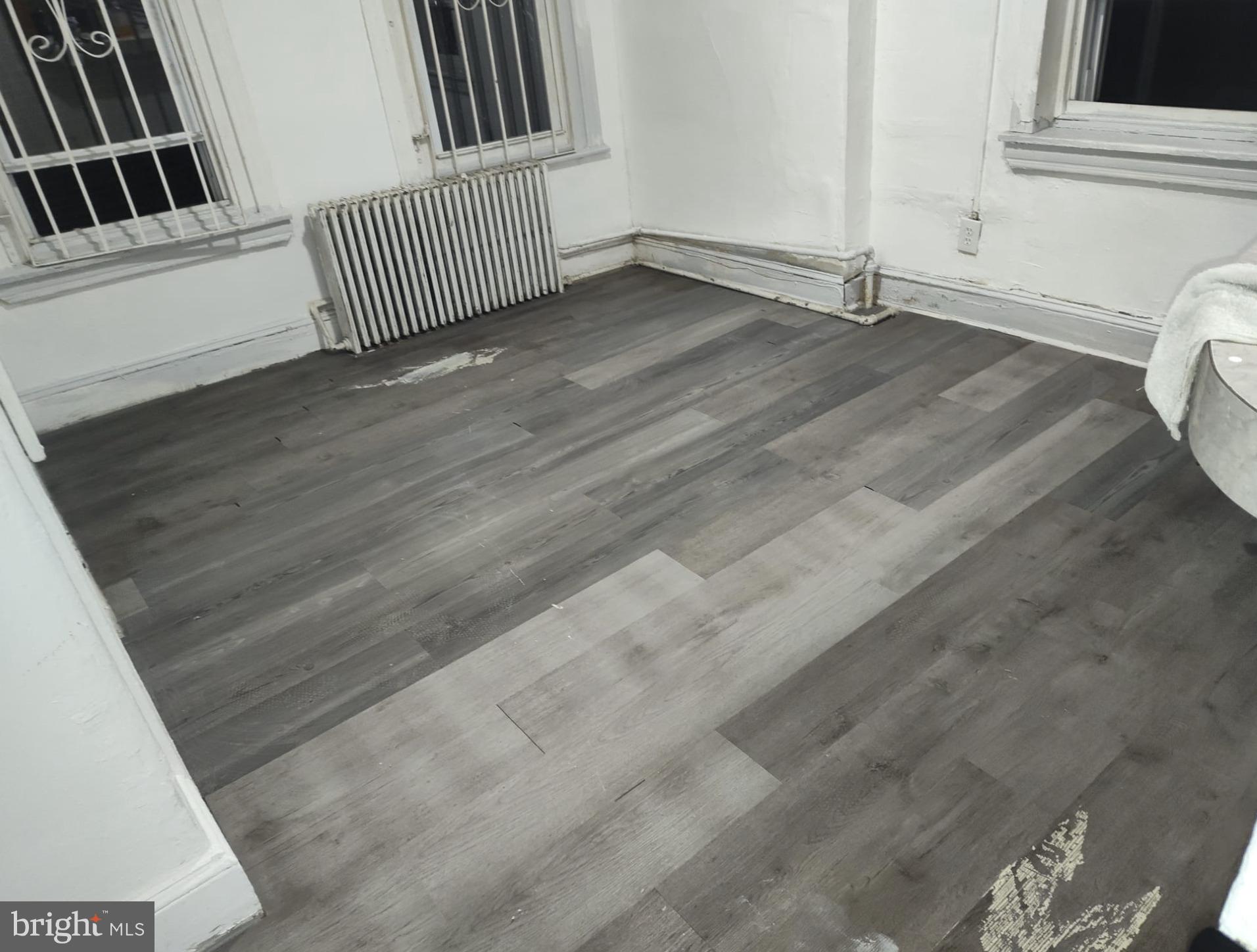 260 West Queen Lane Philadelphia, PA 19144 - Photo 27 of 34 a view of a livingroom with hardwood floor and staircase