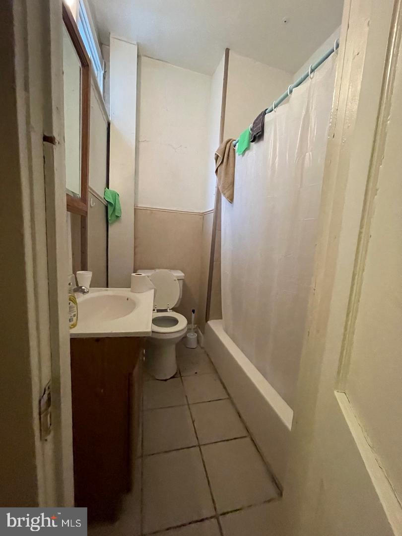 260 West Queen Lane Philadelphia, PA 19144 - Photo 34 of 34 a bathroom with a sink a toilet and shower