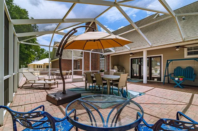 a kitchen with granite countertop a stove and a refrigerator