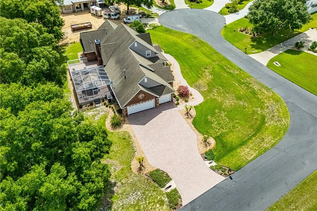 a view of a dining space with a patio and a backyard