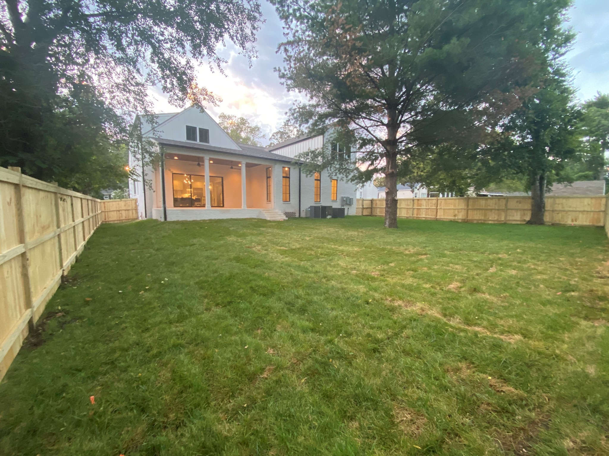 3620 Robin Road Nashville, TN 37204 - Photo 2 of 32 a view of a yard in front of a house with large trees