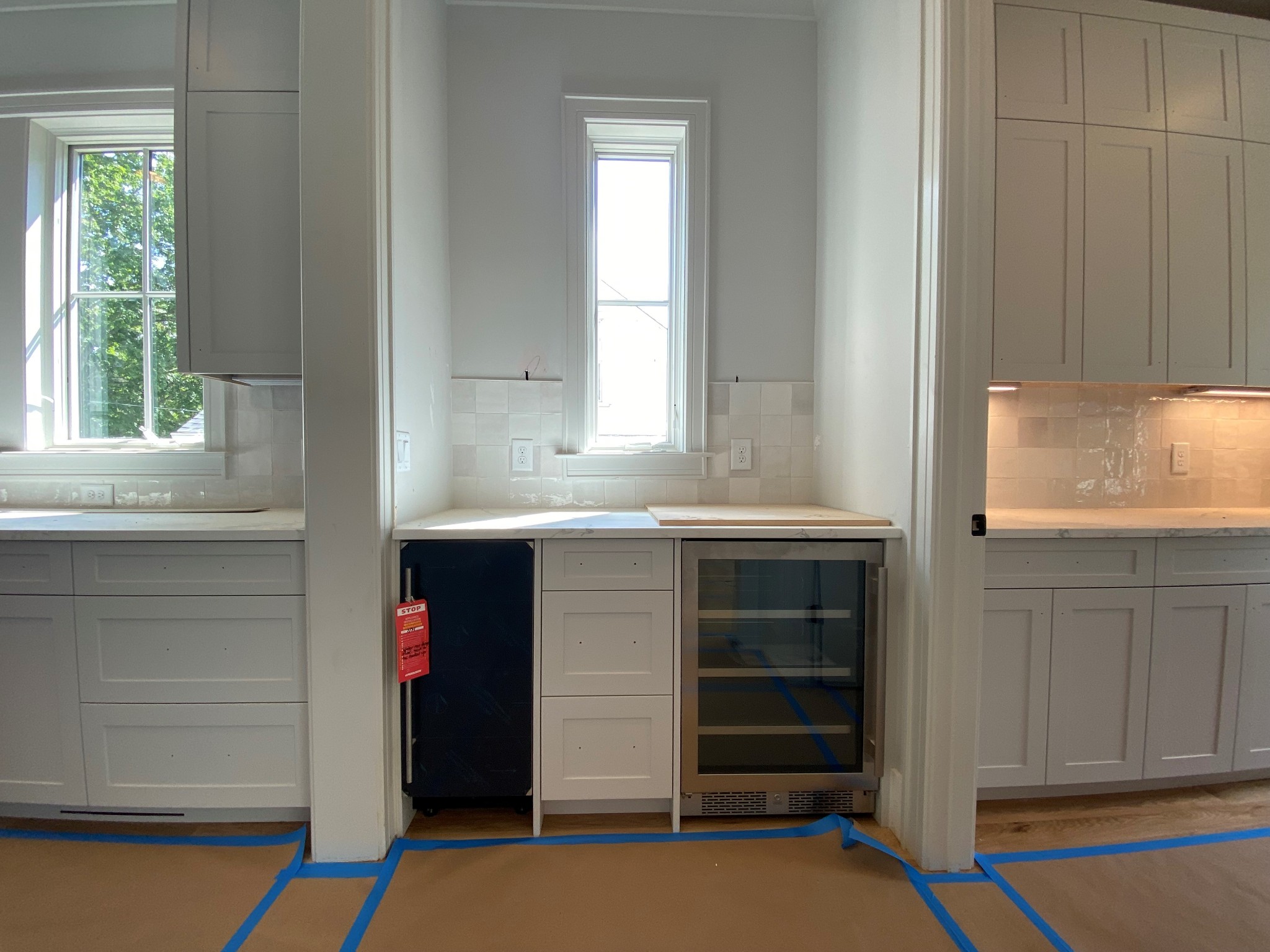 3620 Robin Road Nashville, TN 37204 - Photo 5 of 32 a kitchen with a white cabinets and a refrigerator