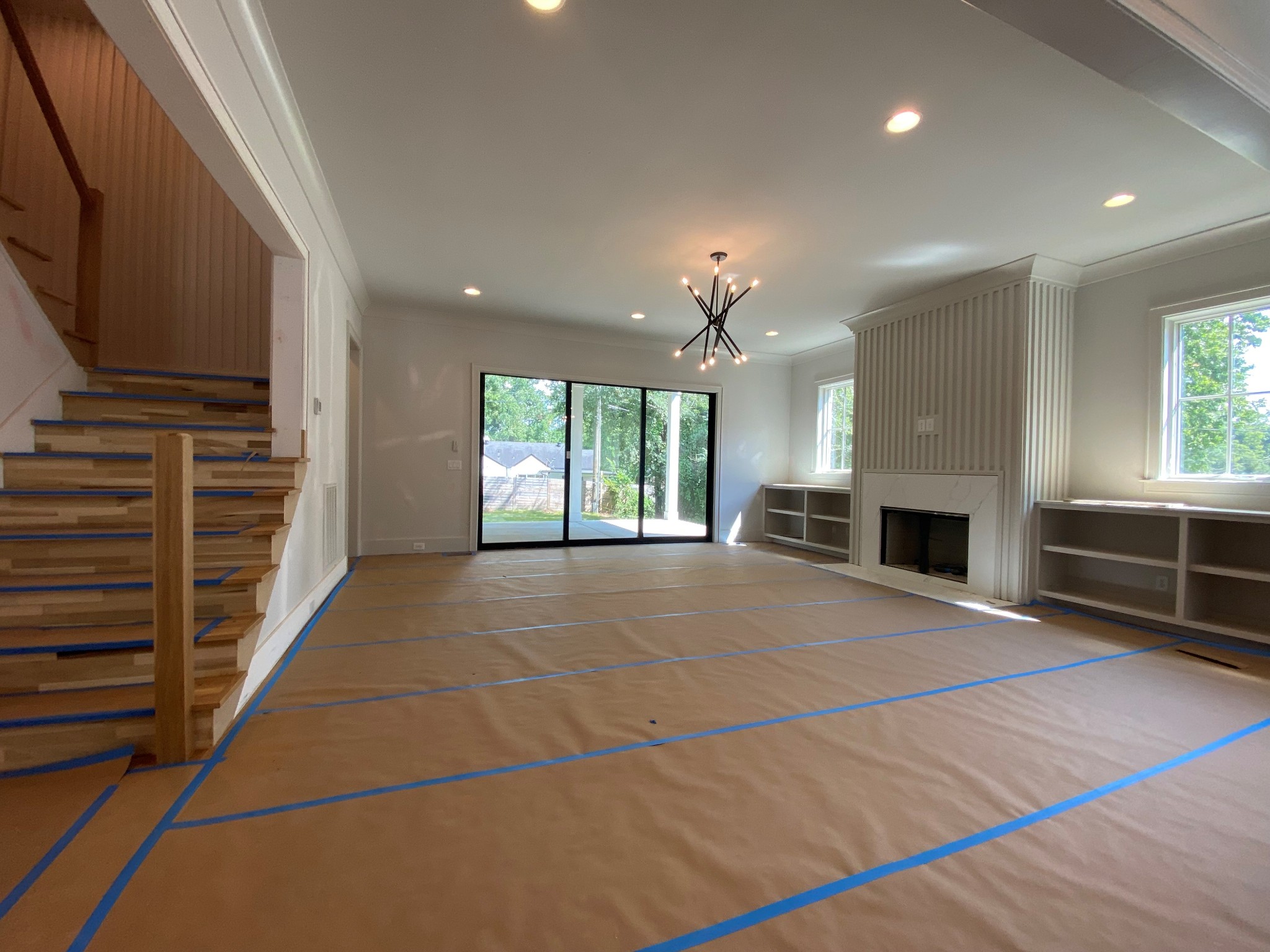 3620 Robin Road Nashville, TN 37204 - Photo 10 of 32 a view of an empty room with a fireplace and a window
