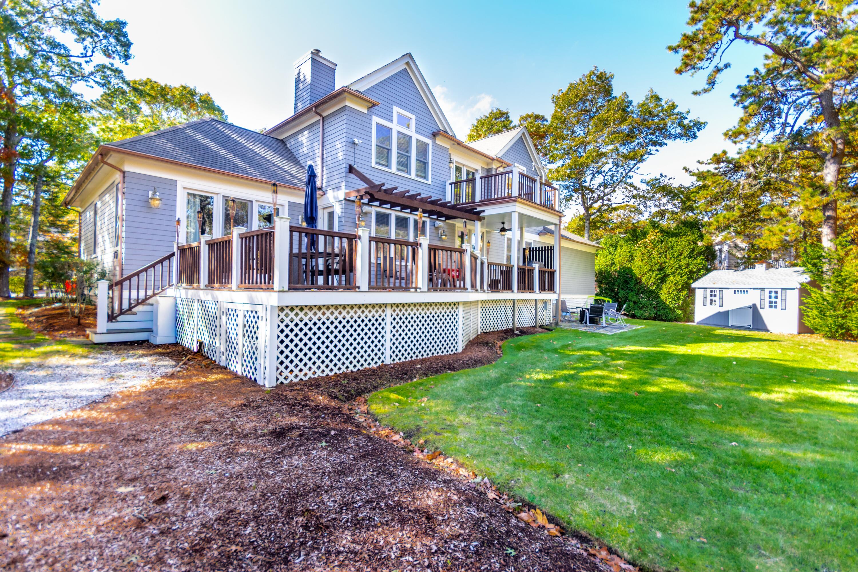42 Fells Pond Road Mashpee, MA 02649 - Photo 4 of 37 Back angle with deck