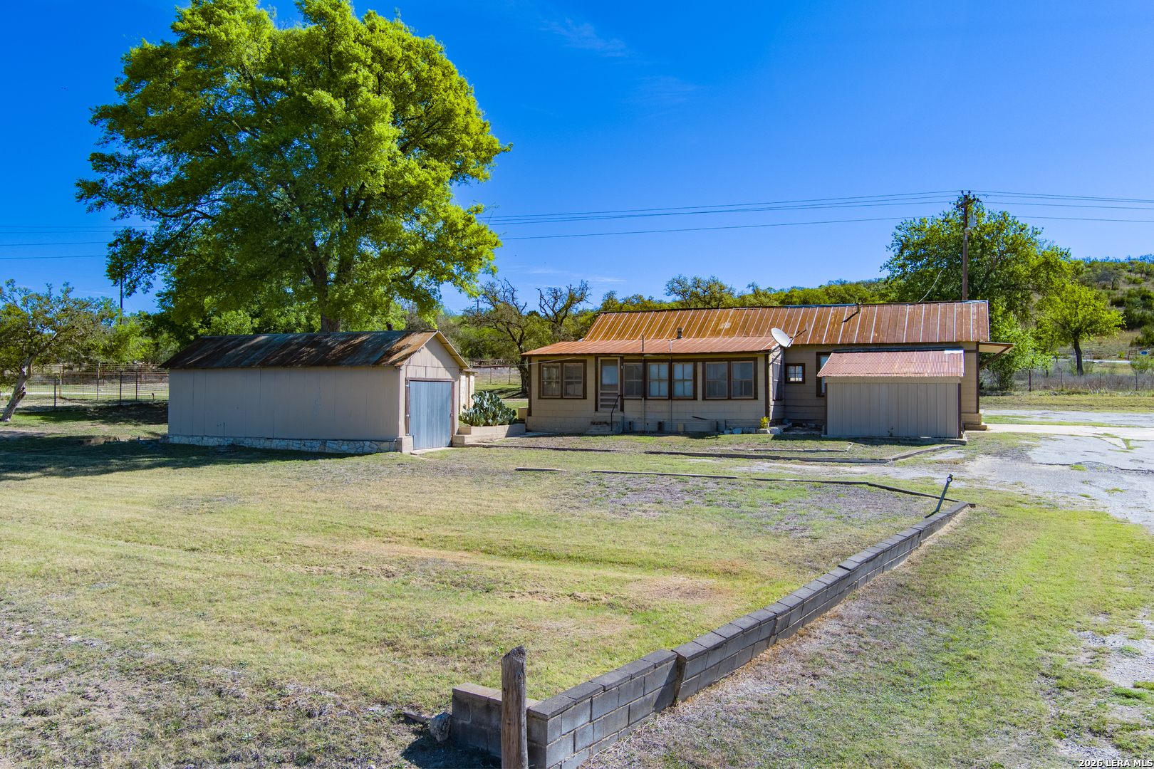 542 Ranch To Market 473 Comfort, TX 78013 - Photo 19 of 31 a front view of a house with a yard