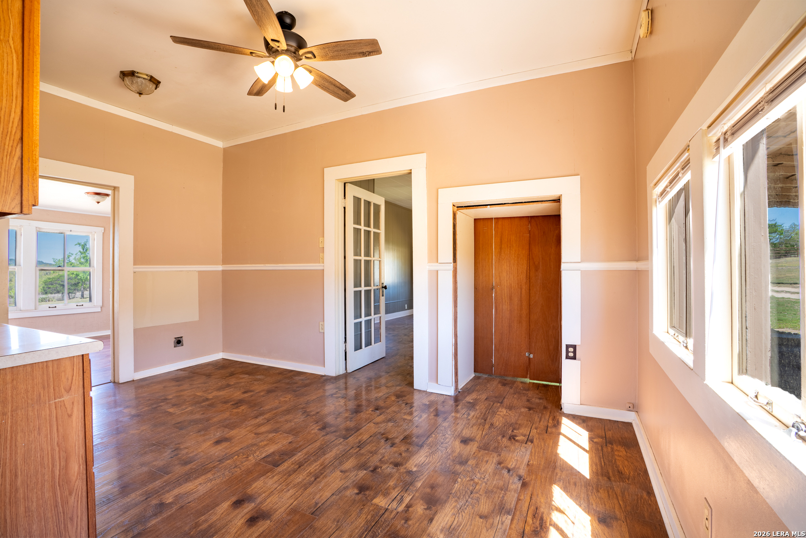 542 Ranch To Market 473 Comfort, TX 78013 - Photo 23 of 31 a view of livingroom with hardwood floor and a ceiling fan