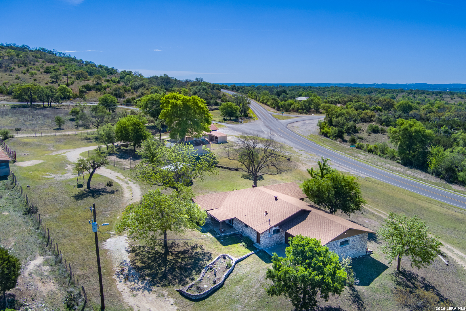 542 Ranch To Market 473 Comfort, TX 78013 - Photo 3 of 31 an aerial view of a house with a garden