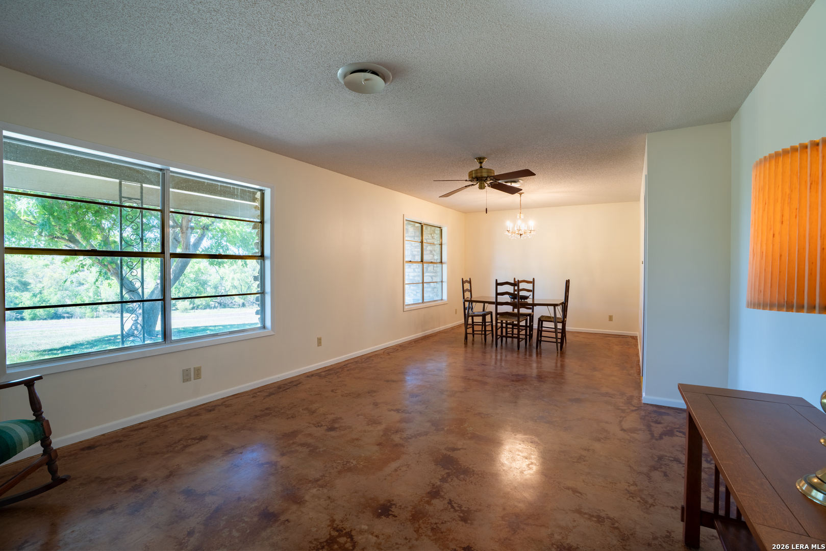 542 Ranch To Market 473 Comfort, TX 78013 - Photo 7 of 31 a view of a dining room with furniture and a chandelier