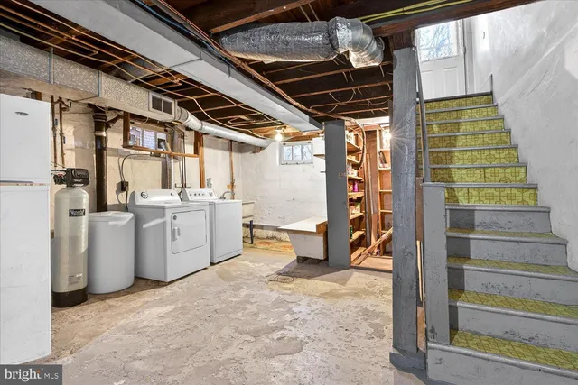 a view of empty room with wooden ceiling