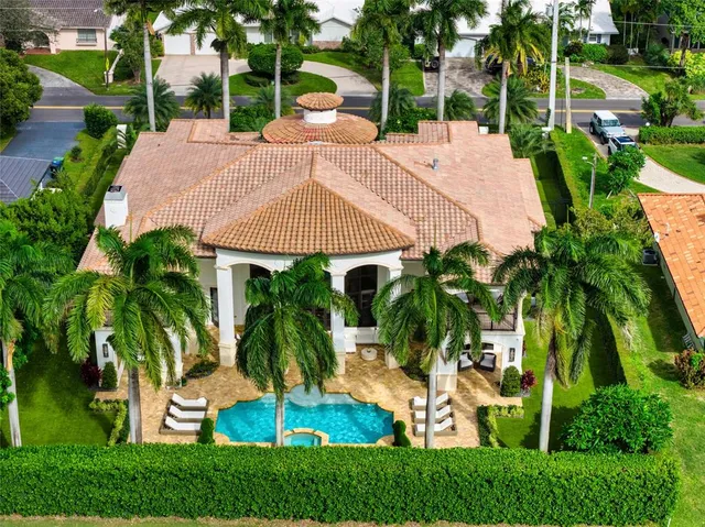 a view of a backyard with a garden and plants