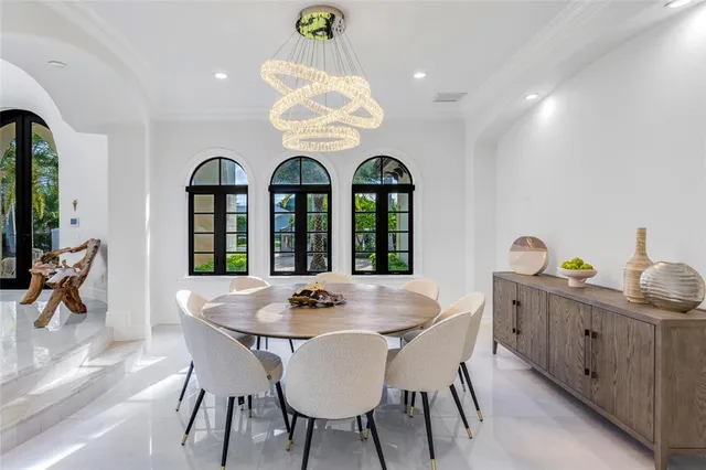 a living room with furniture and a lamp