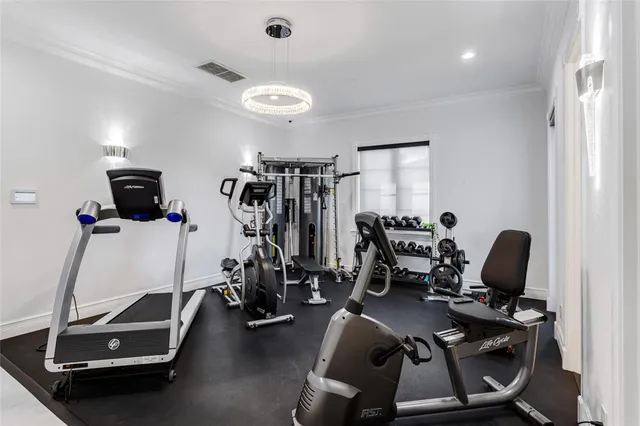 a bed room with a bed and a chair