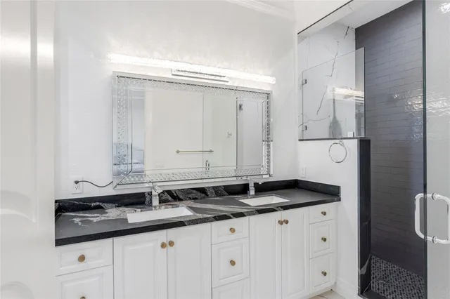 a front view of a house with a yard fire pit table and chairs