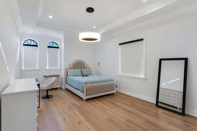 a view of a house with swimming pool and sitting area