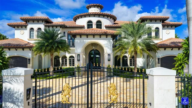 a view of a house with a yard and a fireplace
