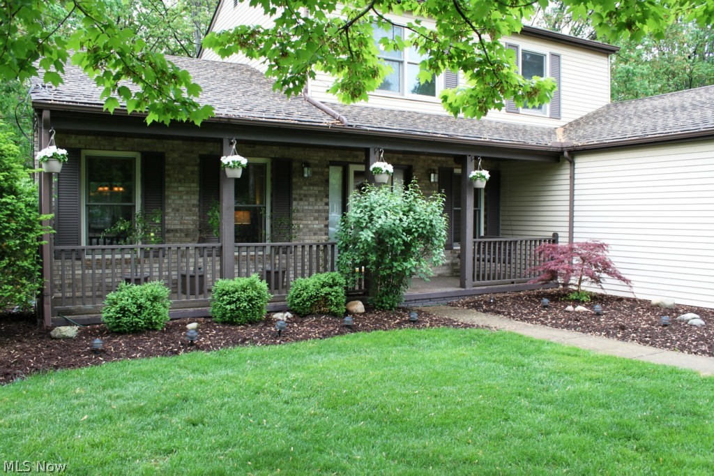 3232 Walter Road Westlake, OH 44145 - Photo 19 of 23 Covered Porch with Beautiful Landscaping and Hanging Baskets!