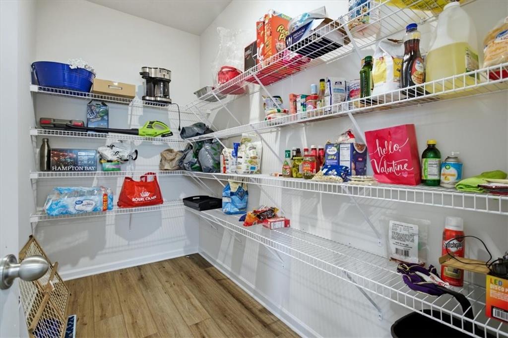 3980 Riverchess Drive Southwest Atlanta, GA 30331 - Photo 14 of 46 a utility room with stainless steel appliances and racks on the wall