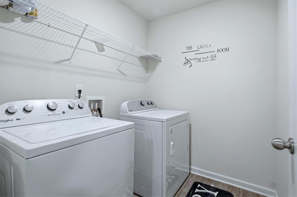 3980 Riverchess Drive Southwest Atlanta, GA 30331 - Photo 15 of 46 a utility room with dryer and washer