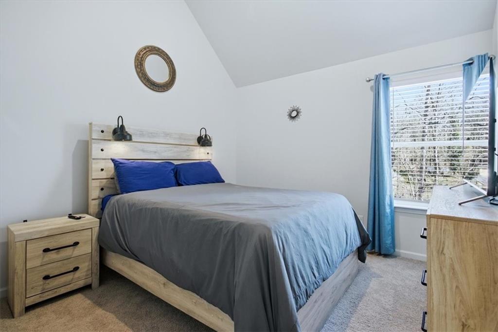 3980 Riverchess Drive Southwest Atlanta, GA 30331 - Photo 16 of 46 a bedroom with a bed and a window