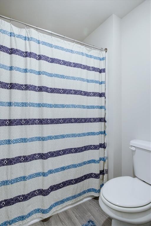 3980 Riverchess Drive Southwest Atlanta, GA 30331 - Photo 19 of 46 a bathroom with a toilet and a shower