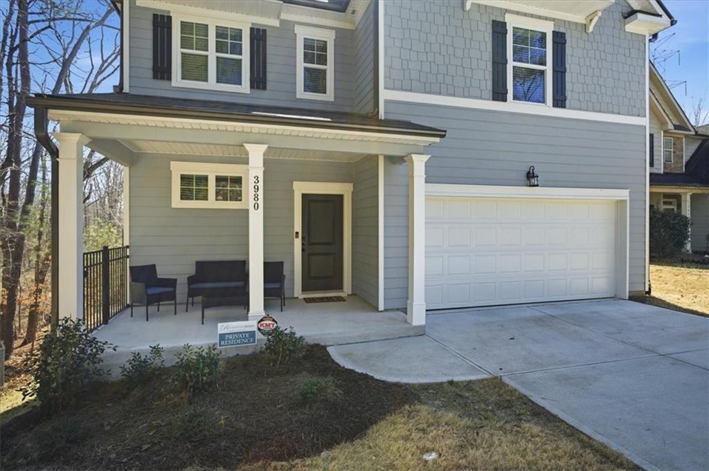 3980 Riverchess Drive Southwest Atlanta, GA 30331 - Photo 3 of 46 a view of a house with backyard and porch