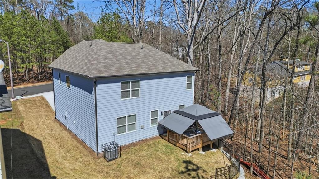 3980 Riverchess Drive Southwest Atlanta, GA 30331 - Photo 41 of 46 a view of a house with backyard and sitting area