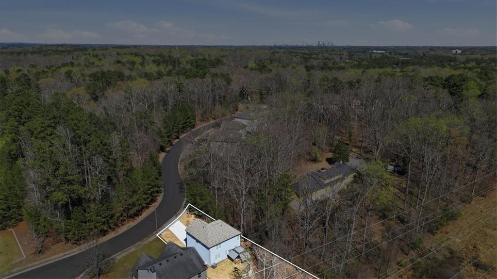 3980 Riverchess Drive Southwest Atlanta, GA 30331 - Photo 46 of 46 a view of a forest with a yard