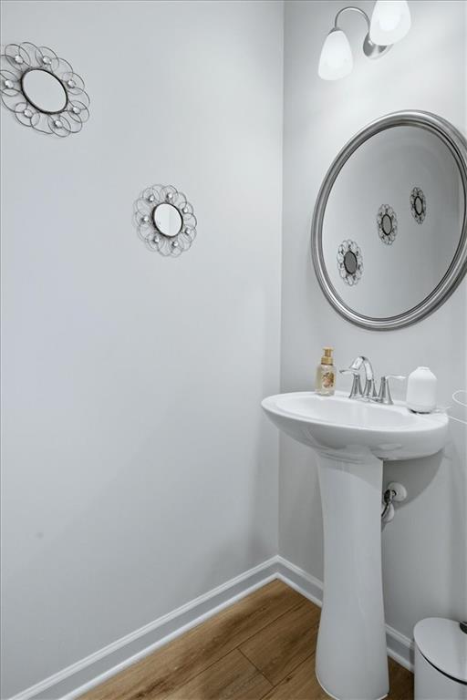 3980 Riverchess Drive Southwest Atlanta, GA 30331 - Photo 6 of 46 a bathroom with a sink toilet and mirror