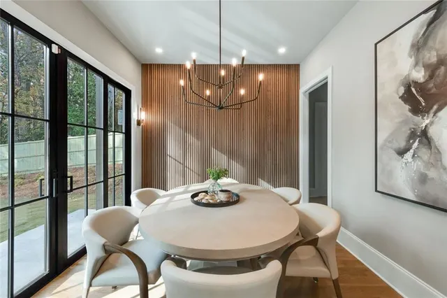 a bedroom with a large bed and a couch