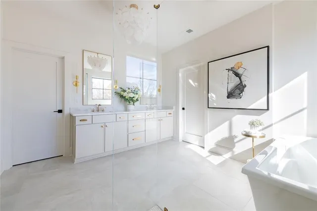 a view of a house with swimming pool and sitting area