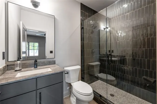 a view of a swimming pool and trees in the background