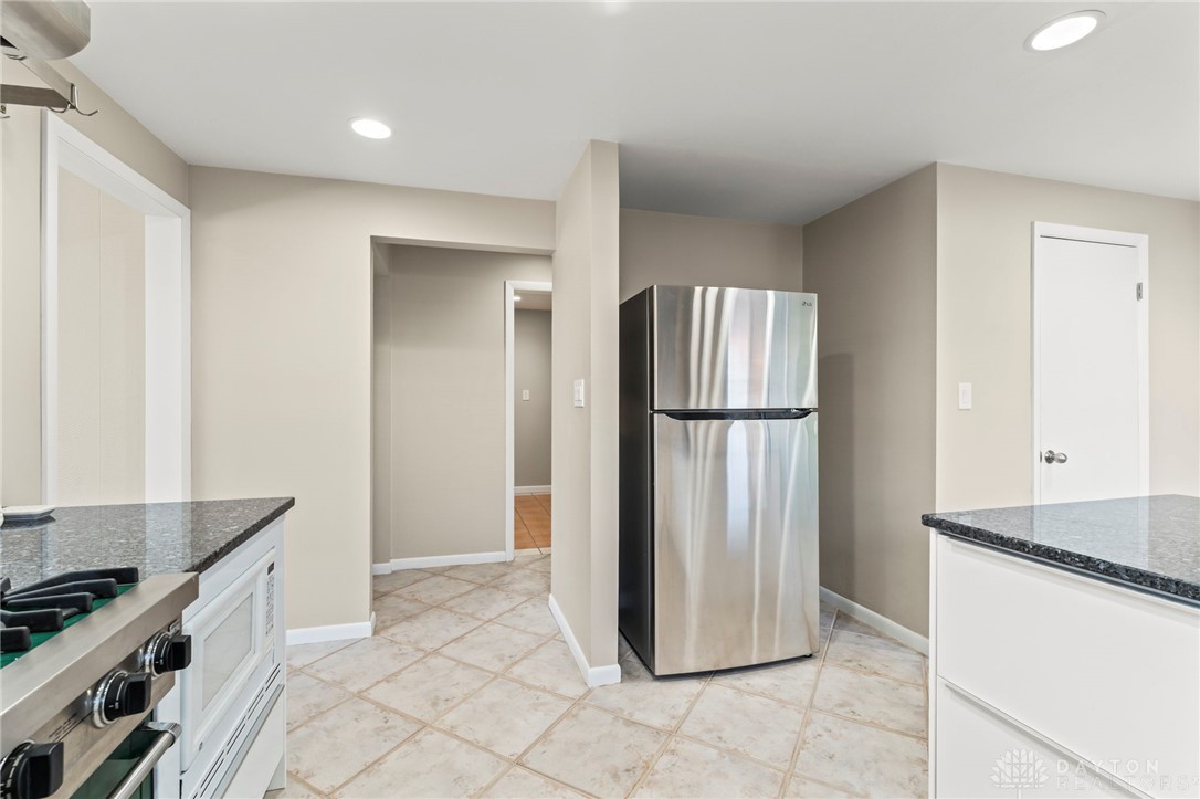 2247 East Whipp Road Dayton, OH 45440 - Photo 23 of 52 This spacious kitchen offers ample room for culinary creativity and everyday living.