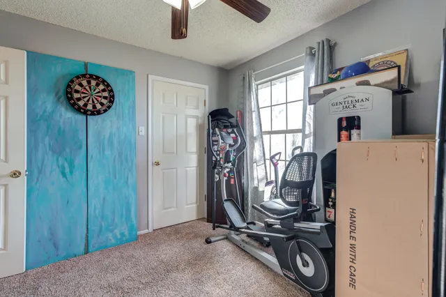 a view of a room with gym equipment
