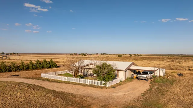 an ocean beach with outdoor seating