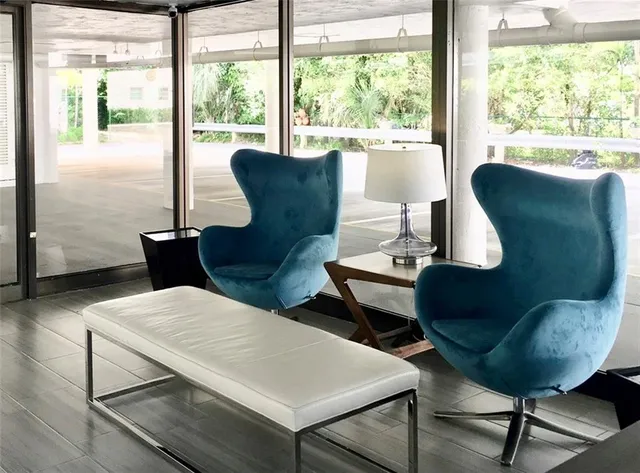 a living room with furniture and a window