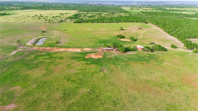 a view of a yard with an outdoor space
