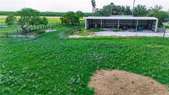 a view of a garden with a lake