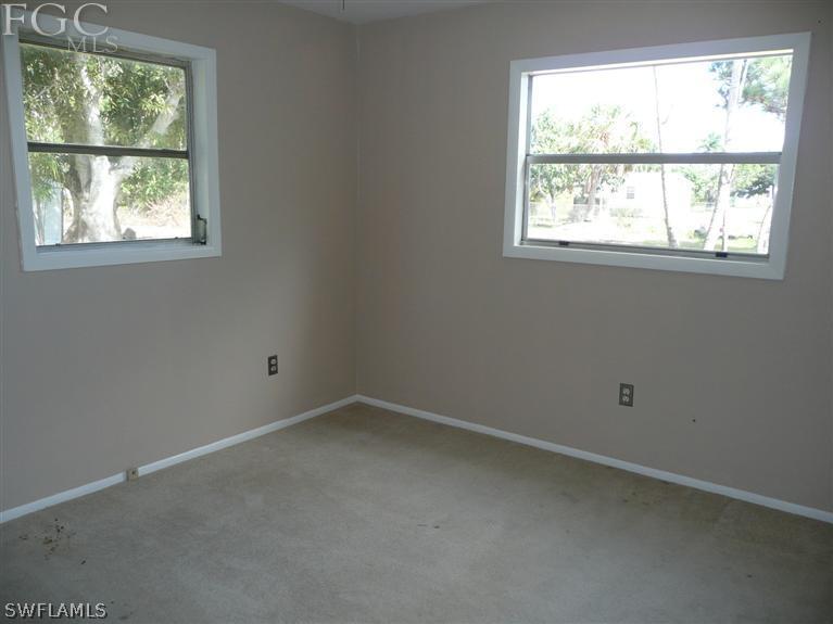 5952 Sailfish Road Bokeelia, FL 33922 - Photo 18 of 20 an empty room with a window