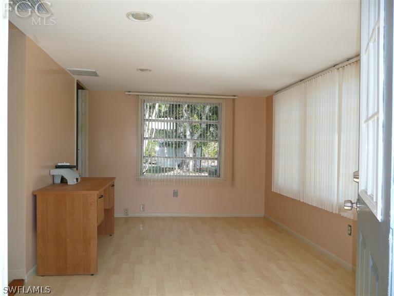 5952 Sailfish Road Bokeelia, FL 33922 - Photo 8 of 20 a view of an empty room with a window