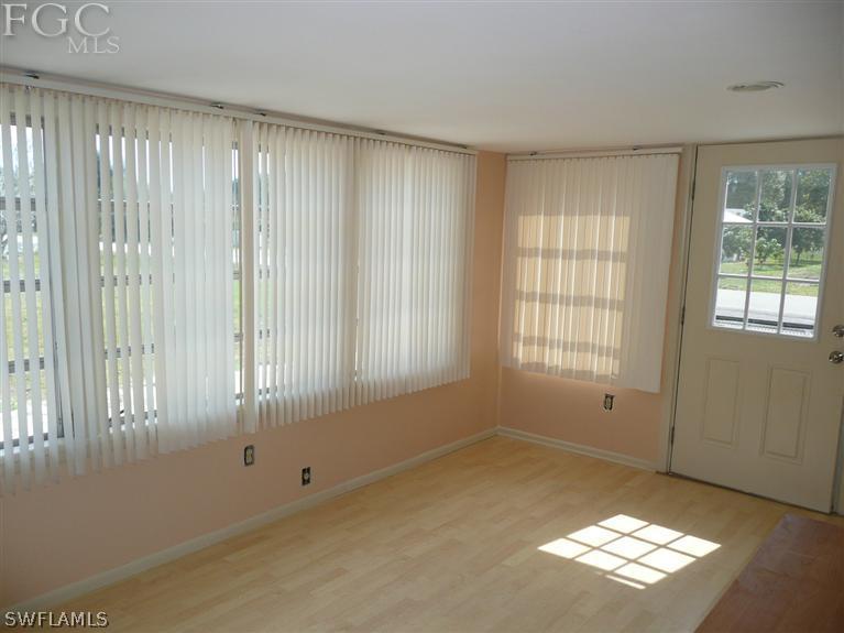 5952 Sailfish Road Bokeelia, FL 33922 - Photo 9 of 20 a view of an empty room with a window