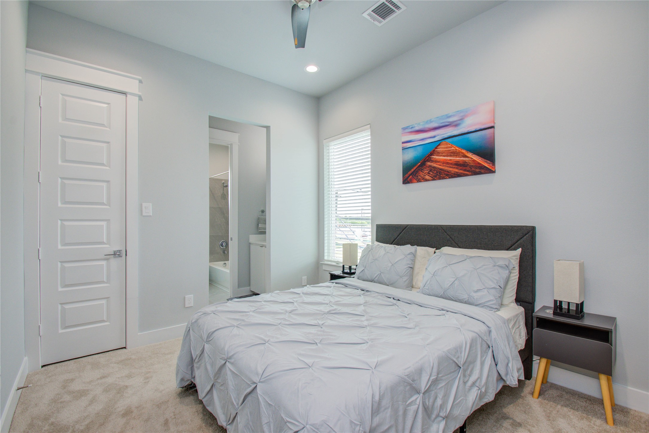 2549 Hollister Road Houston, TX 77080 - Photo 11 of 16 a bedroom with a bed and painting on the wall
