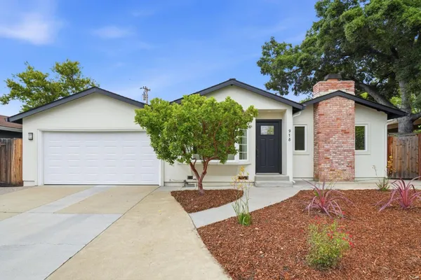 a house with trees in front of it