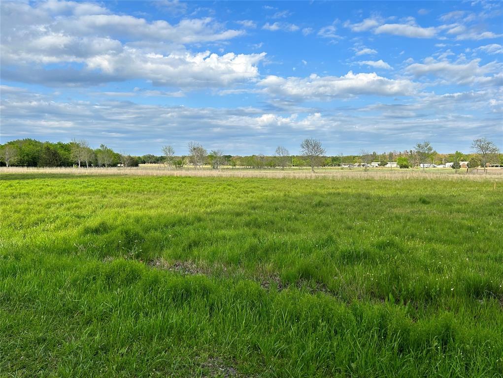 a view of an ocean and a mountain