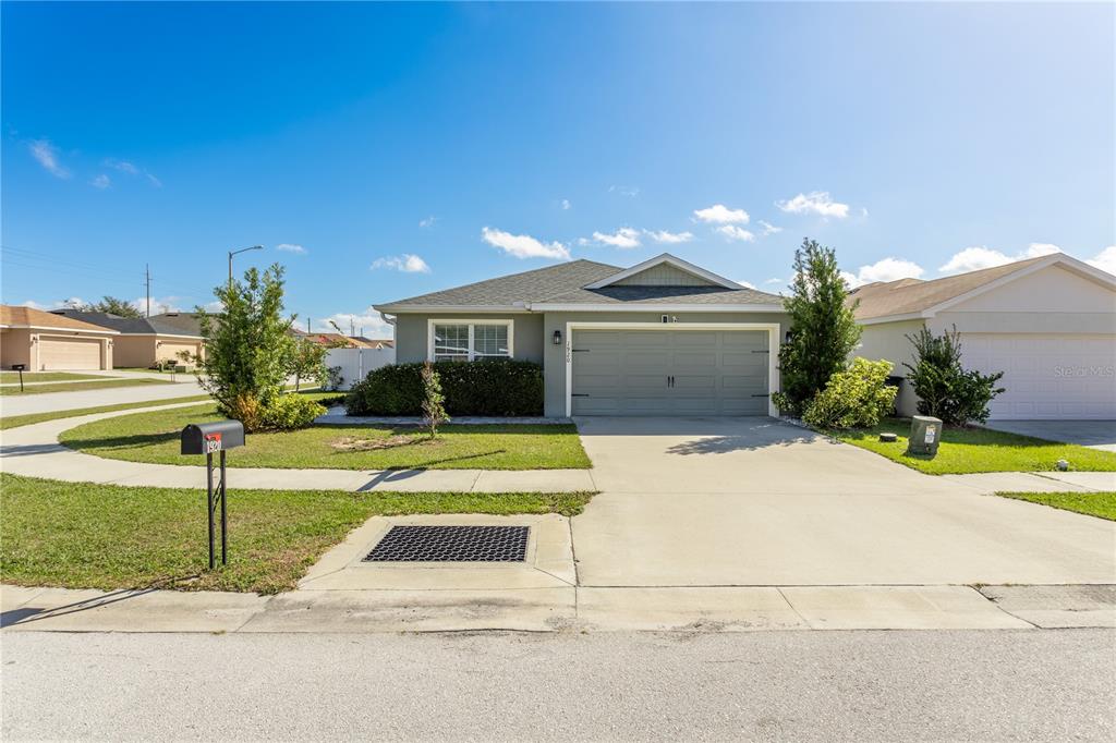 1920 Bretton Ridge Drive Winter Haven, FL 33884 - Photo 1 of 1 a view of house and outdoor space with yard