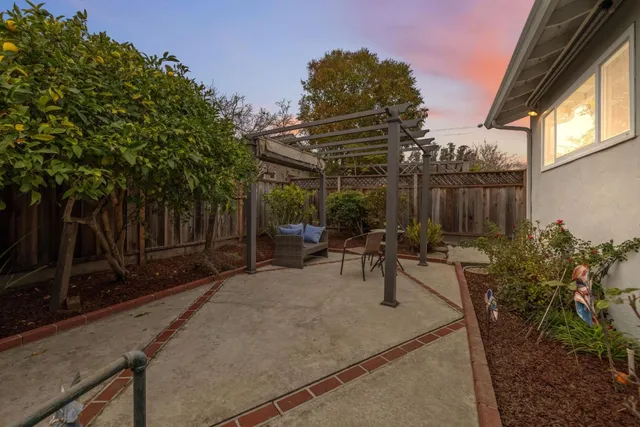 a view of garden with patio