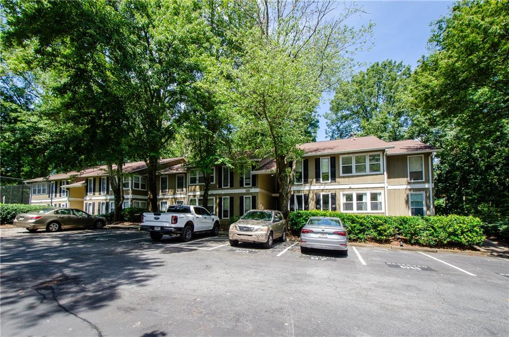 5157 Roswell Road, Unit 2 Atlanta, GA 30342 - Photo 22 of 24 a car parked in front of a house