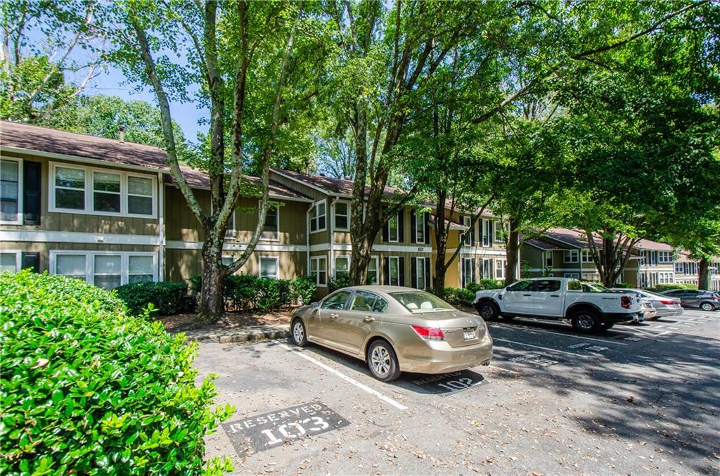5157 Roswell Road, Unit 2 Atlanta, GA 30342 - Photo 23 of 24 a car parked in front of a house
