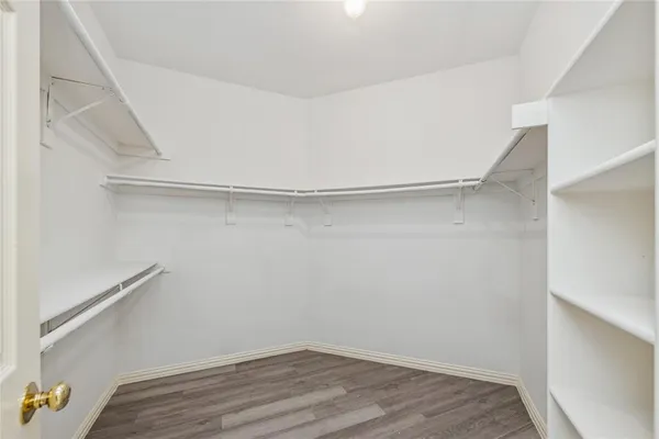 a view of an empty walk in closet