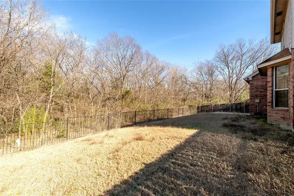 a view of a yard covered with snow in the yard
