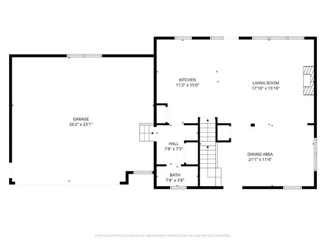 a living room with fireplace furniture and a flat screen tv
